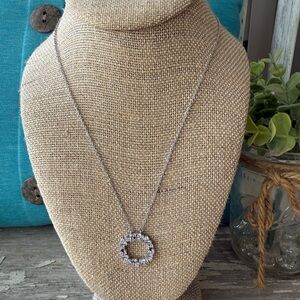 Elegant Silver Necklace with Circular Crystal Pendant